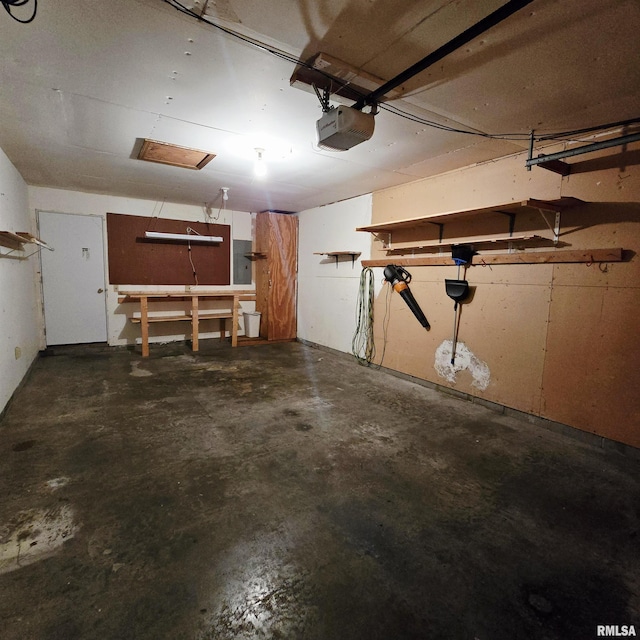 414 S Clayton St, Benton, IL 62812 - garage featuring a garage door opener and electric panel