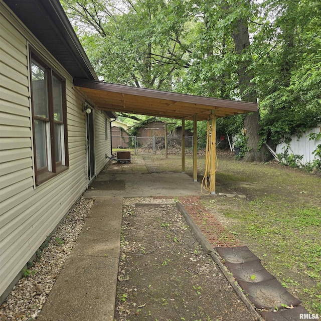 414 S Clayton St, Benton, IL 62812 - view of yard featuring central AC and a patio area