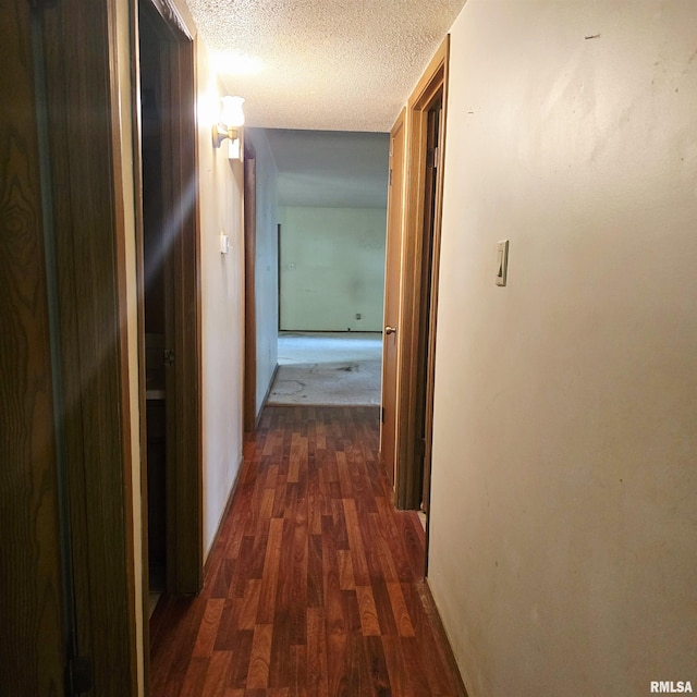 414 S Clayton St, Benton, IL 62812 - corridor featuring dark wood-style floors and a textured ceiling