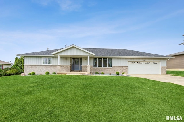404 10th St, Lowden, IA 52255 - ranch-style home with driveway, an attached garage, a front lawn, and brick siding