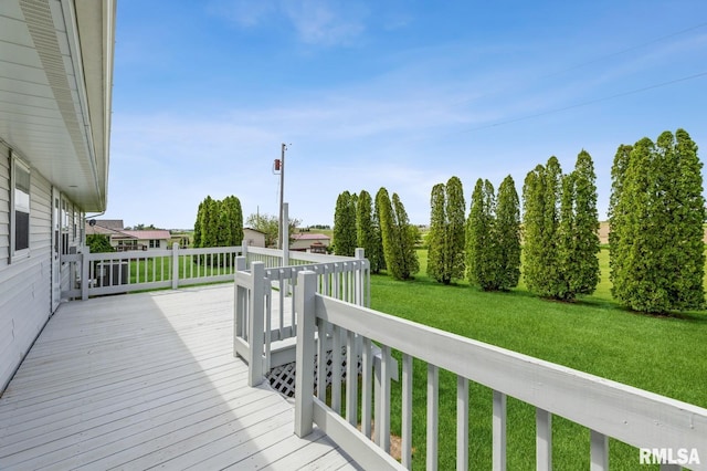 404 10th St, Lowden, IA 52255 - wooden deck with a yard
