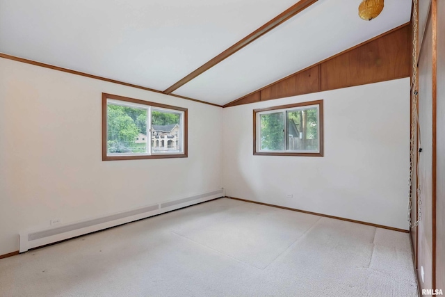 2402 Middle Rd, Davenport, IA 52803 - carpeted spare room featuring a baseboard heating unit, vaulted ceiling, healthy amount of natural light, and baseboards