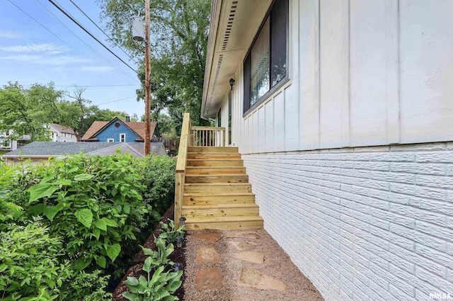 2402 Middle Rd, Davenport, IA 52803 - view of property exterior featuring board and batten siding and stairway