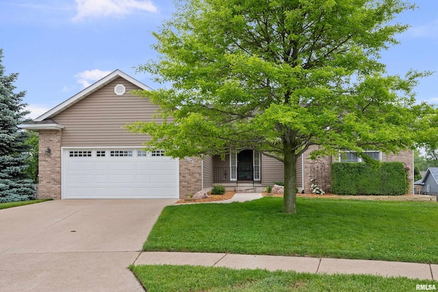 5142 Fillmore Ct, Davenport, IA 52806 - view of front facade with brick siding, concrete driveway, an attached garage, and a front lawn