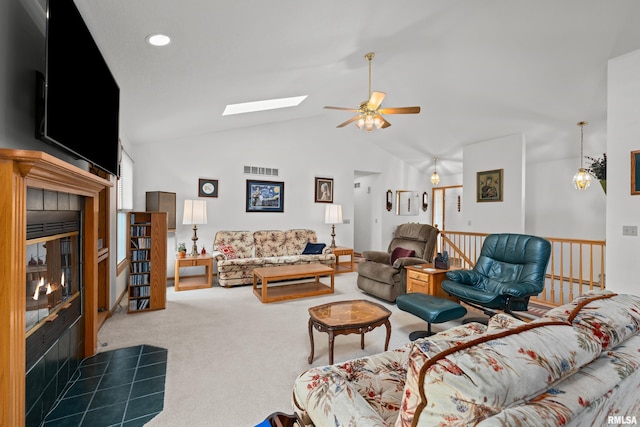 5142 Fillmore Ct, Davenport, IA 52806 - living room featuring carpet, ceiling fan, vaulted ceiling, a skylight, and recessed lighting