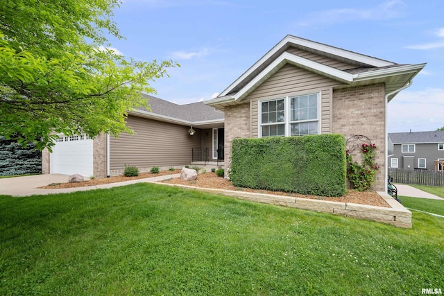 5142 Fillmore Ct, Davenport, IA 52806 - ranch-style house with a garage, brick siding, and concrete driveway