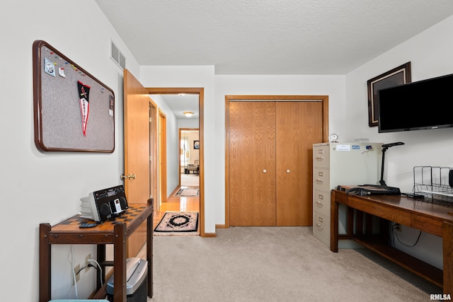 5142 Fillmore Ct, Davenport, IA 52806 - home office with light carpet and a textured ceiling
