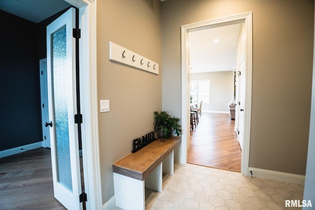 6654 Meghan Ave, Bettendorf, IA 52722 - mudroom with wood finished floors and baseboards