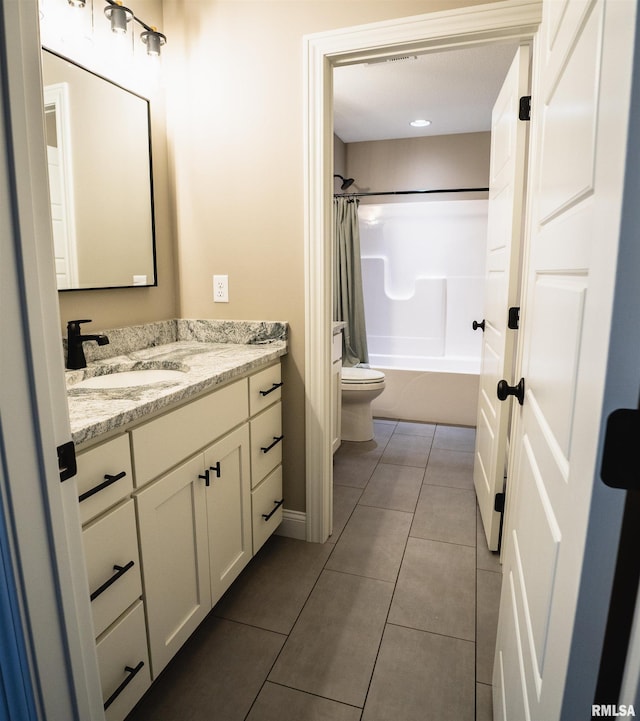 6654 Meghan Ave, Bettendorf, IA 52722 - full bathroom with toilet, vanity, tile patterned flooring, shower / bath combination with curtain, and baseboards