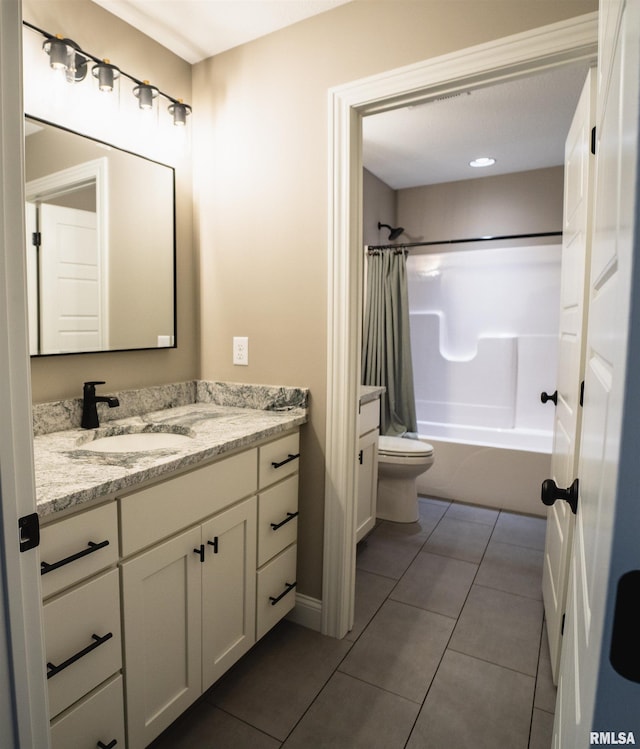 6654 Meghan Ave, Bettendorf, IA 52722 - bathroom featuring vanity, toilet, shower / bath combo, tile patterned floors, and baseboards