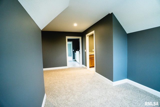 6654 Meghan Ave, Bettendorf, IA 52722 - corridor featuring light carpet, baseboards, and recessed lighting