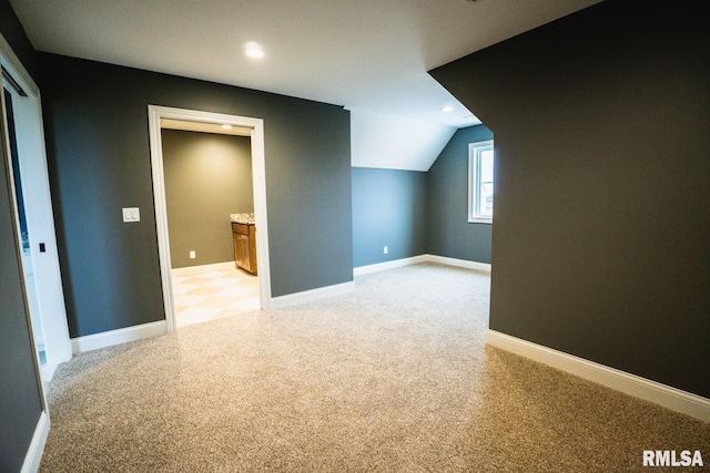 6654 Meghan Ave, Bettendorf, IA 52722 - bonus room with light colored carpet, vaulted ceiling, recessed lighting, and baseboards