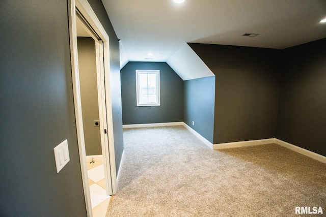6654 Meghan Ave, Bettendorf, IA 52722 - bonus room with light colored carpet, vaulted ceiling, baseboards, and recessed lighting