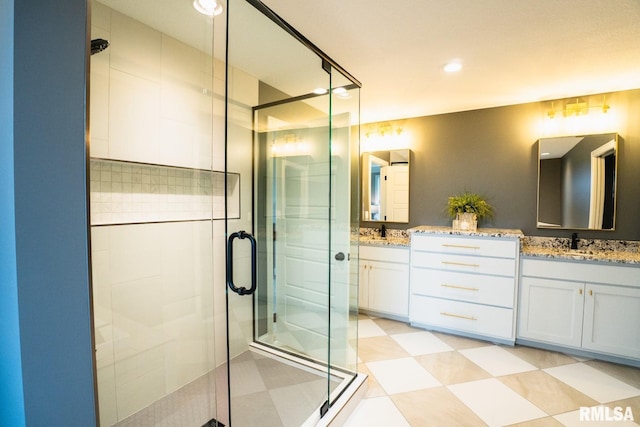 6654 Meghan Ave, Bettendorf, IA 52722 - bathroom with a stall shower, double vanity, recessed lighting, and tile patterned floors
