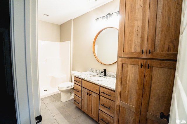 6654 Meghan Ave, Bettendorf, IA 52722 - full bath featuring vanity, toilet, tile patterned floors, and a walk in shower