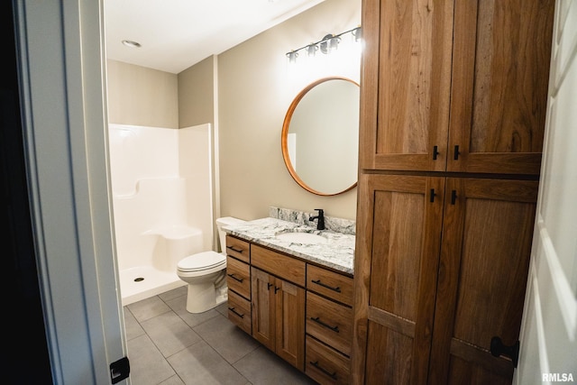 6654 Meghan Ave, Bettendorf, IA 52722 - full bath featuring vanity, toilet, tile patterned floors, and a shower