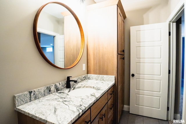 6654 Meghan Ave, Bettendorf, IA 52722 - bathroom featuring vanity, tile patterned floors, and baseboards