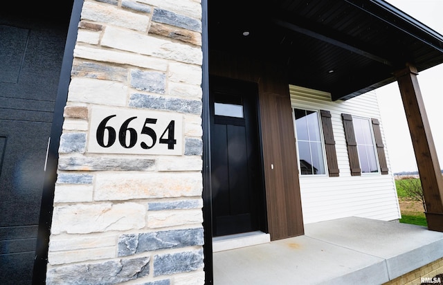 6654 Meghan Ave, Bettendorf, IA 52722 - entrance to property with stone siding