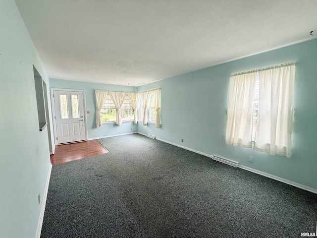 10 Blackhawk Hills Ct, Rock Island, IL 61201 - spare room featuring dark carpet and baseboards