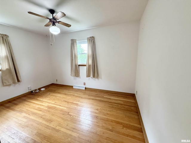 10 Blackhawk Hills Ct, Rock Island, IL 61201 - unfurnished room featuring light wood-style floors, ceiling fan, and baseboards