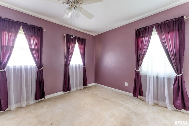 2215 N Nevada Ave, Davenport, IA 52804 - unfurnished room featuring ceiling fan and carpet