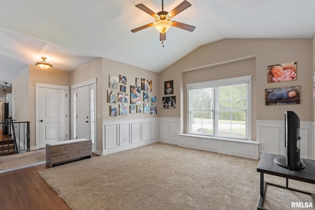 3484 Field Sike Dr, Bettendorf, IA 52722 - entryway featuring a wainscoted wall, a ceiling fan, vaulted ceiling, a decorative wall, and wood finished floors