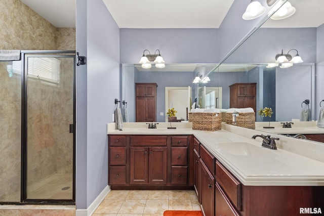 3484 Field Sike Dr, Bettendorf, IA 52722 - bathroom featuring double vanity, a stall shower, and tile patterned flooring