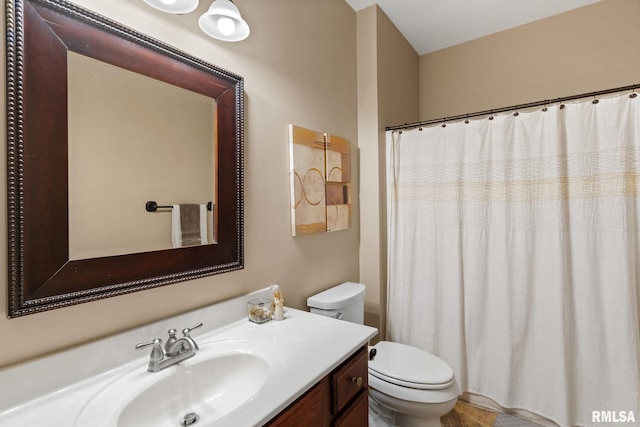 3484 Field Sike Dr, Bettendorf, IA 52722 - bathroom with toilet, vanity, and curtained shower