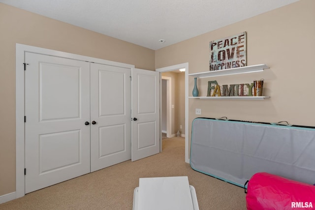 3484 Field Sike Dr, Bettendorf, IA 52722 - bedroom with carpet floors, baseboards, and a closet