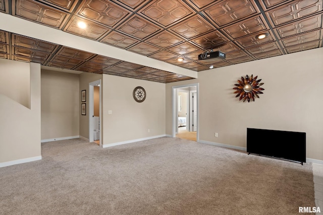 3484 Field Sike Dr, Bettendorf, IA 52722 - unfurnished living room featuring an ornate ceiling, baseboards, and light colored carpet