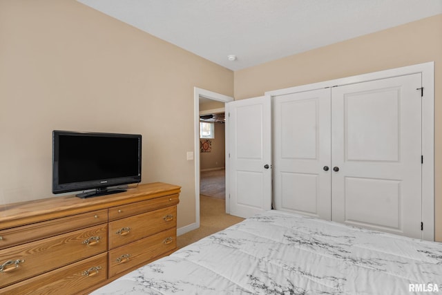 3484 Field Sike Dr, Bettendorf, IA 52722 - bedroom featuring light carpet and a closet