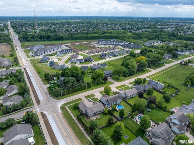 3484 Field Sike Dr, Bettendorf, IA 52722 - aerial view of property and surrounding area featuring nearby suburban area and a tree filled landscape