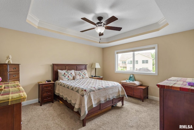 3608 Glengevlin Way, Bettendorf, IA 52722 - bedroom with a tray ceiling, crown molding, light carpet, and baseboards