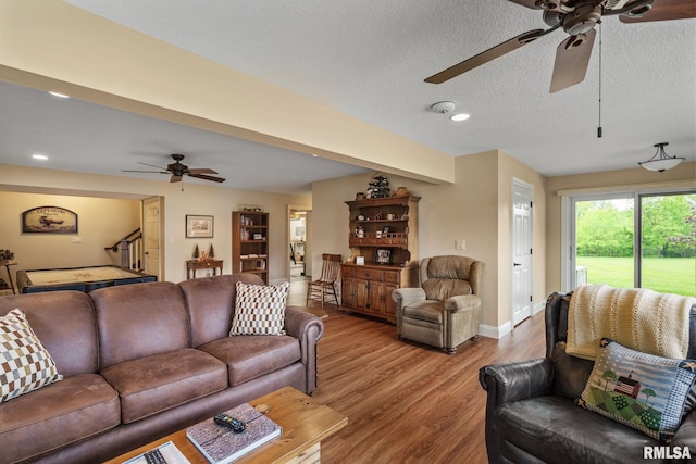3608 Glengevlin Way, Bettendorf, IA 52722 - living area with ceiling fan, wood finished floors, baseboards, a textured ceiling, and recessed lighting