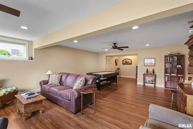 3608 Glengevlin Way, Bettendorf, IA 52722 - living room with wood finished floors, a ceiling fan, recessed lighting, baseboards, and a textured ceiling