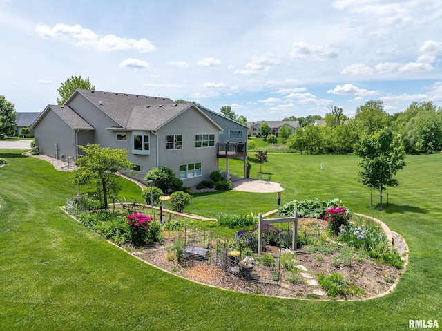 3608 Glengevlin Way, Bettendorf, IA 52722 - view of grassy yard with a garden