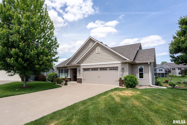 3608 Glengevlin Way, Bettendorf, IA 52722 - ranch-style house featuring an attached garage, driveway, a front yard, a shingled roof, and stone siding
