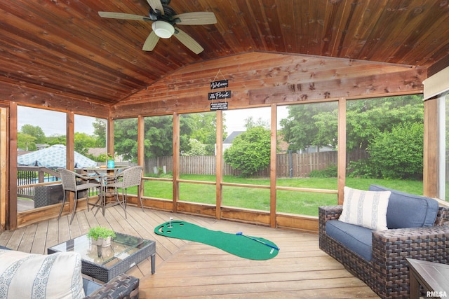 1425 W 48th St, Davenport, IA 52806 - sunroom with vaulted ceiling, ceiling fan, outdoor dining area, and outdoor lounge area