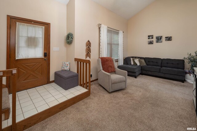 1425 W 48th St, Davenport, IA 52806 - carpeted living room featuring vaulted ceiling