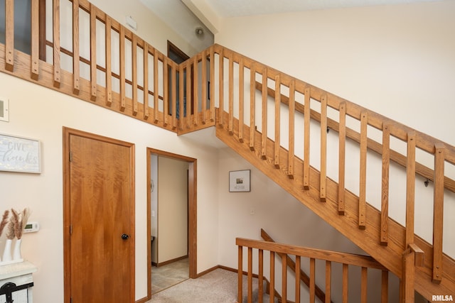 1425 W 48th St, Davenport, IA 52806 - staircase with carpet flooring and baseboards