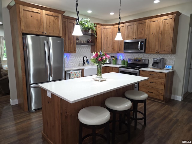 179 Hazel Rd, Simpson, IL 62985 - kitchen featuring stainless steel appliances, dark wood finished floors, a sink, recessed lighting, and a kitchen island