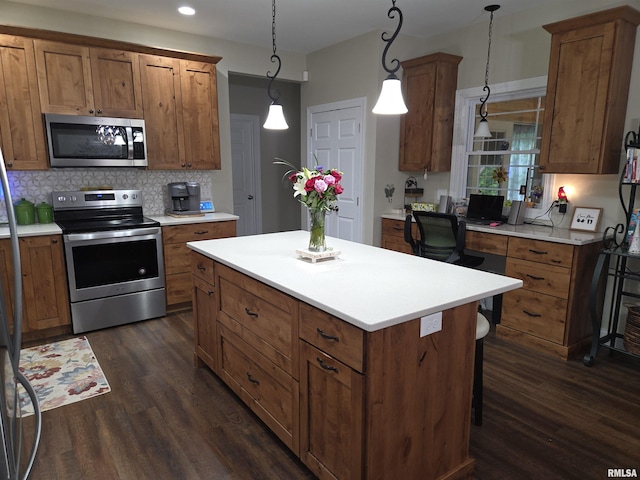 179 Hazel Rd, Simpson, IL 62985 - kitchen with stainless steel appliances, dark wood finished floors, brown cabinets, and recessed lighting