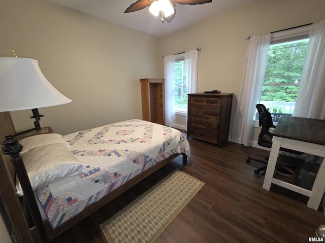 179 Hazel Rd, Simpson, IL 62985 - bedroom with wood finished floors, a ceiling fan, and baseboards