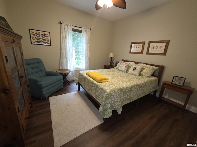 179 Hazel Rd, Simpson, IL 62985 - bedroom with wood finished floors, a ceiling fan, and baseboards