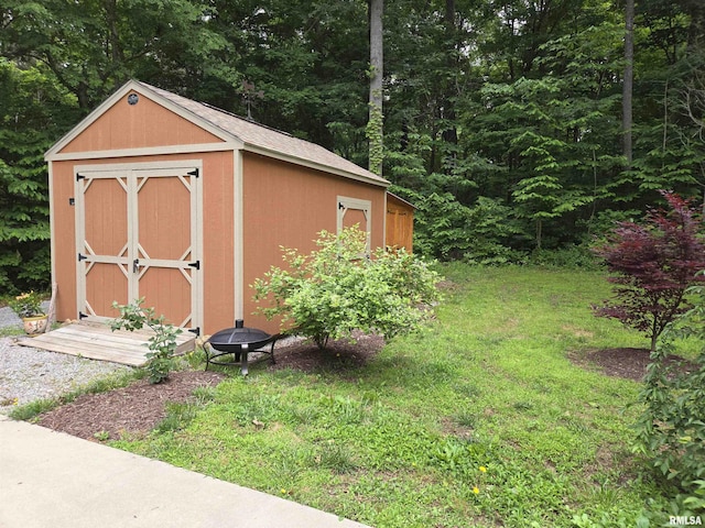 179 Hazel Rd, Simpson, IL 62985 - view of shed featuring a wooded view