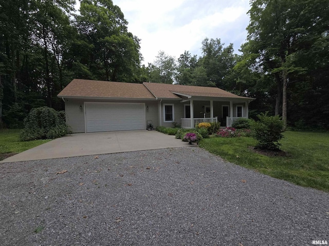 179 Hazel Rd, Simpson, IL 62985 - single story home with driveway, covered porch, and a garage