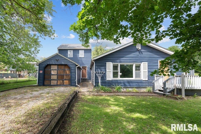 1240 Spruce St, Buffalo, IA 52728 - view of front facade with dirt driveway, a wooden deck, and an attached garage