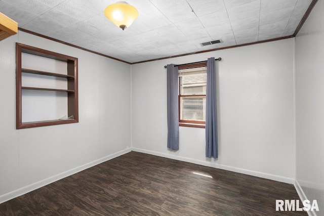 1240 Spruce St, Buffalo, IA 52728 - unfurnished room featuring ornamental molding, wood finished floors, and baseboards