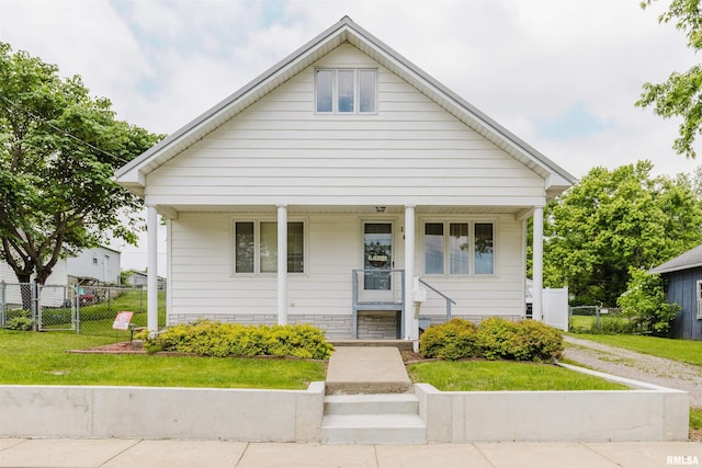 1408 Newton Ave, Johnston City, IL 62951 - bungalow featuring a porch