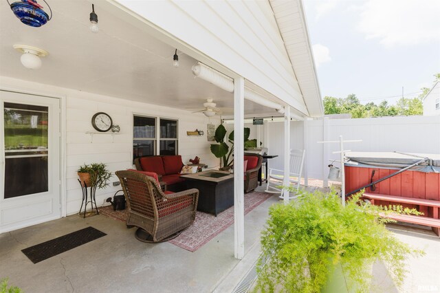 1408 Newton Ave, Johnston City, IL 62951 - view of patio / terrace featuring a hot tub, ceiling fan, and an outdoor living space